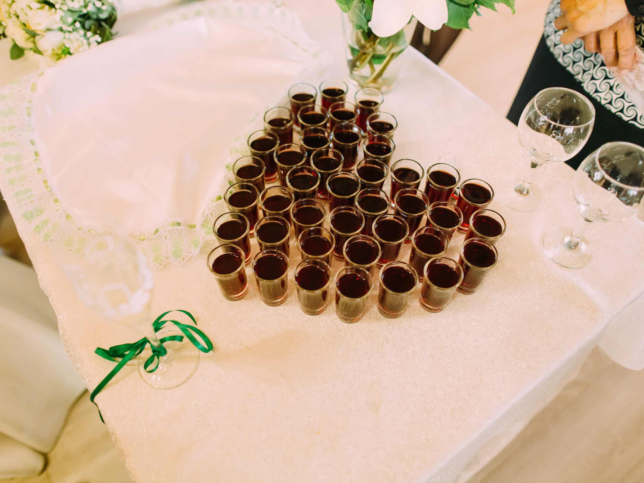 Above view of the glasses with whiskey in the form of the heart